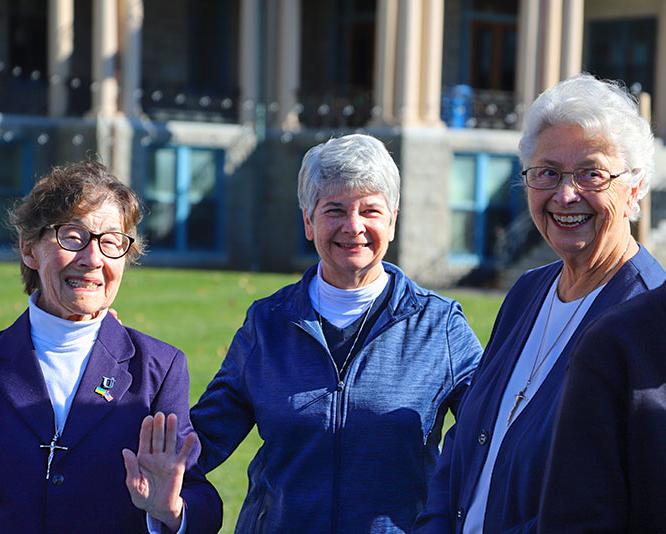 Group of IHM sisters on college campus